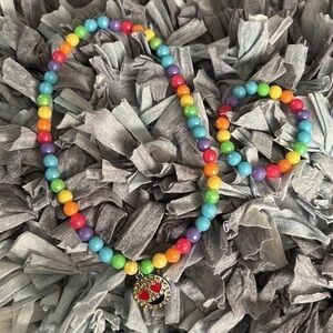 Girls colorful stretchy necklace and bracelet set.